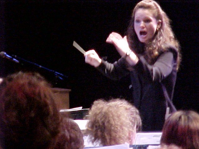 Robin Hollett conducting the combined Terrace Community Band and Moderato